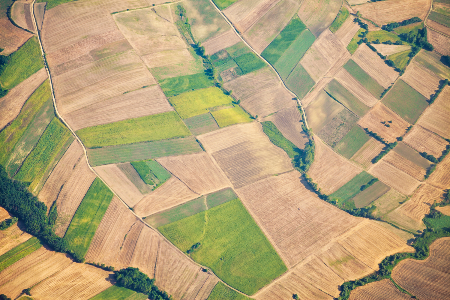 luchtfoto met allerlei percelen